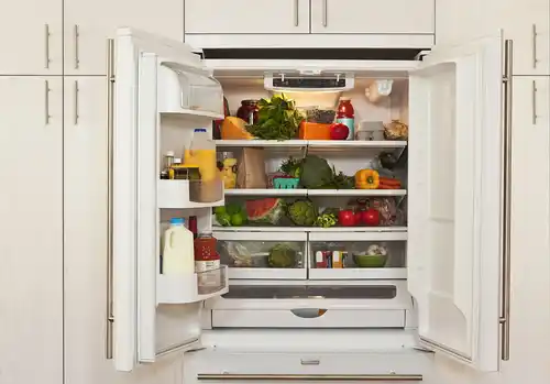 view-of-inside-of-refrigerator-with-healthy-food-royalty-free-image-1702587732
